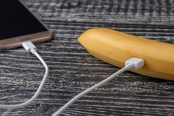 USB-C cord plugged into banana